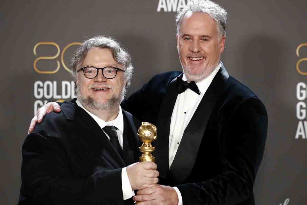 A destra Mark Gustafson insieme a Guillermo Del Toro: un Oscar e tre Globes assieme...