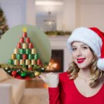 donna vestita a tema natale e albero di capsule