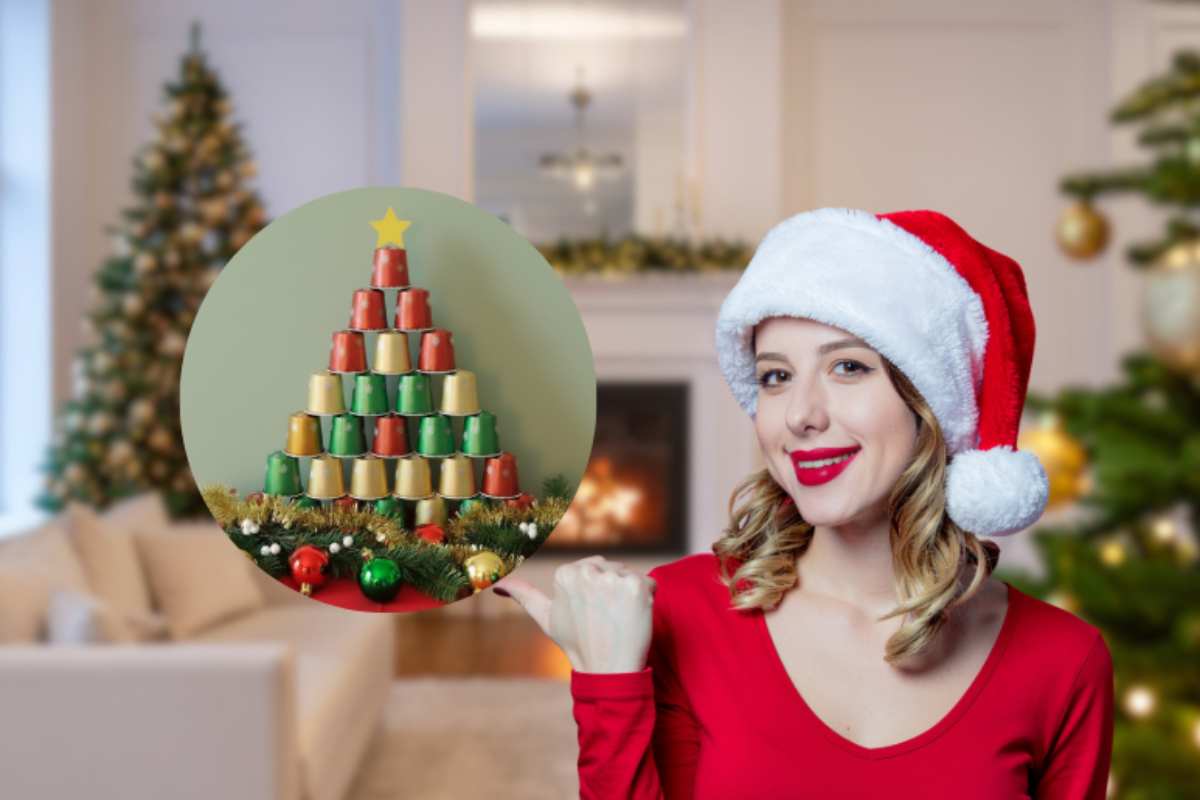 donna vestita a tema natale e albero di capsule