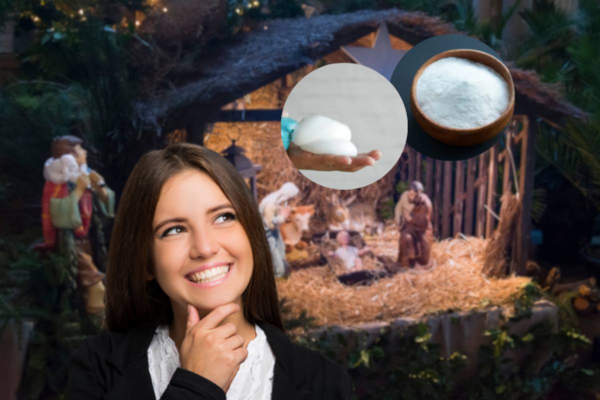 donna che pensa con presepe alle spalle e miniature di bicarbonato e schiuma da barba