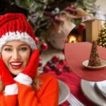 donna vestita in tema natalizio e tavola con alberelli di cioccolato