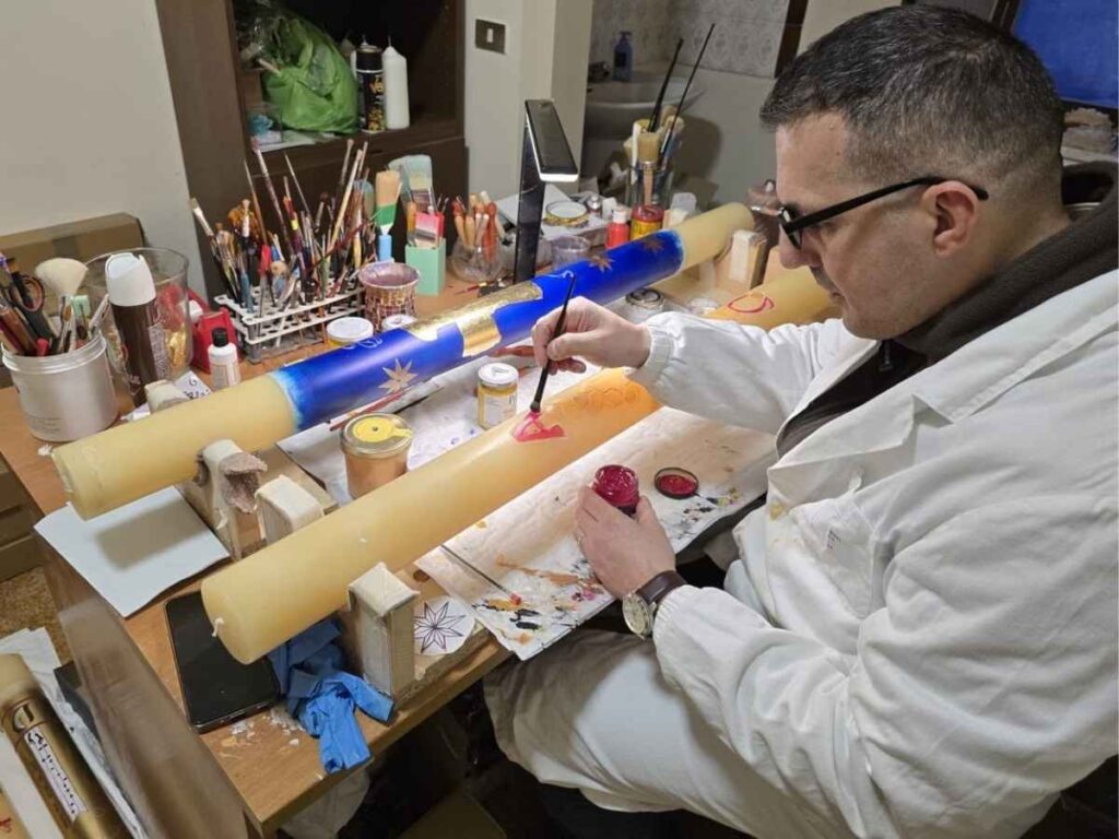 Padre Carlo e i suoi ceri